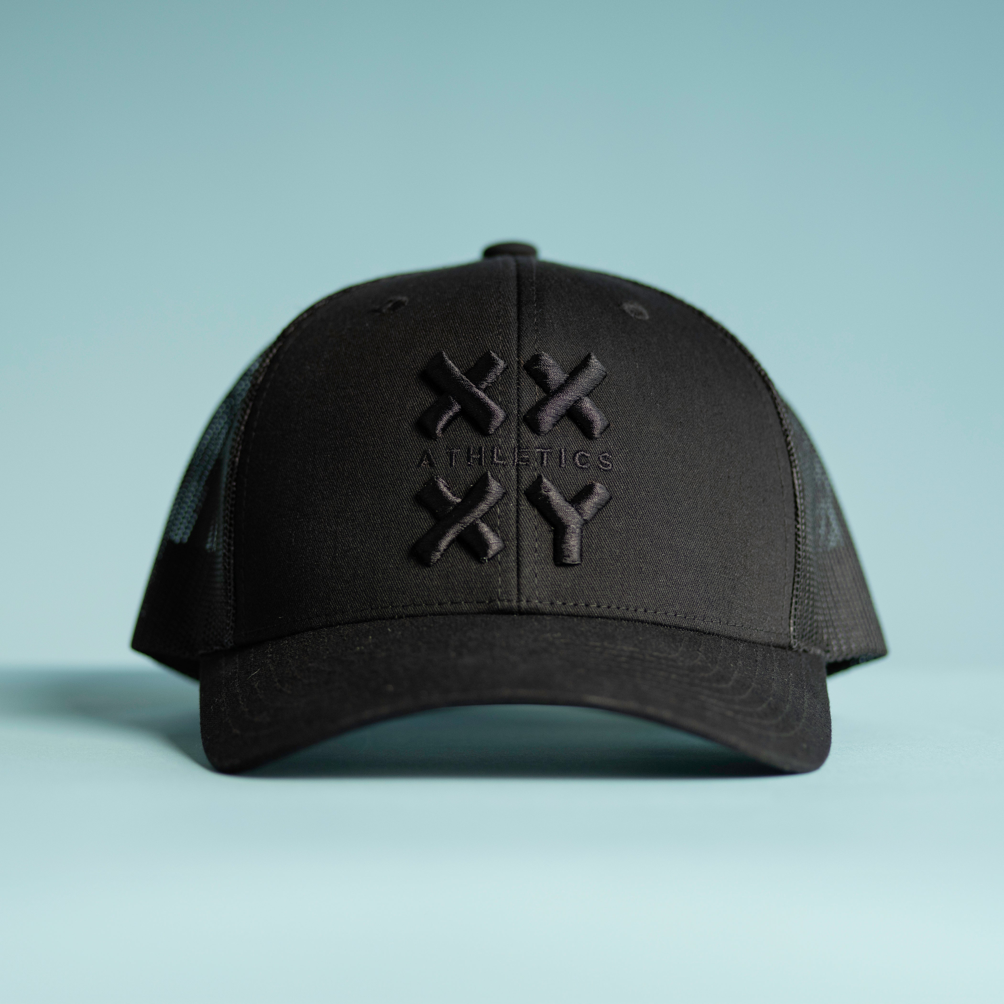 Blackout Logo Trucker Cap, front view with sleek black design