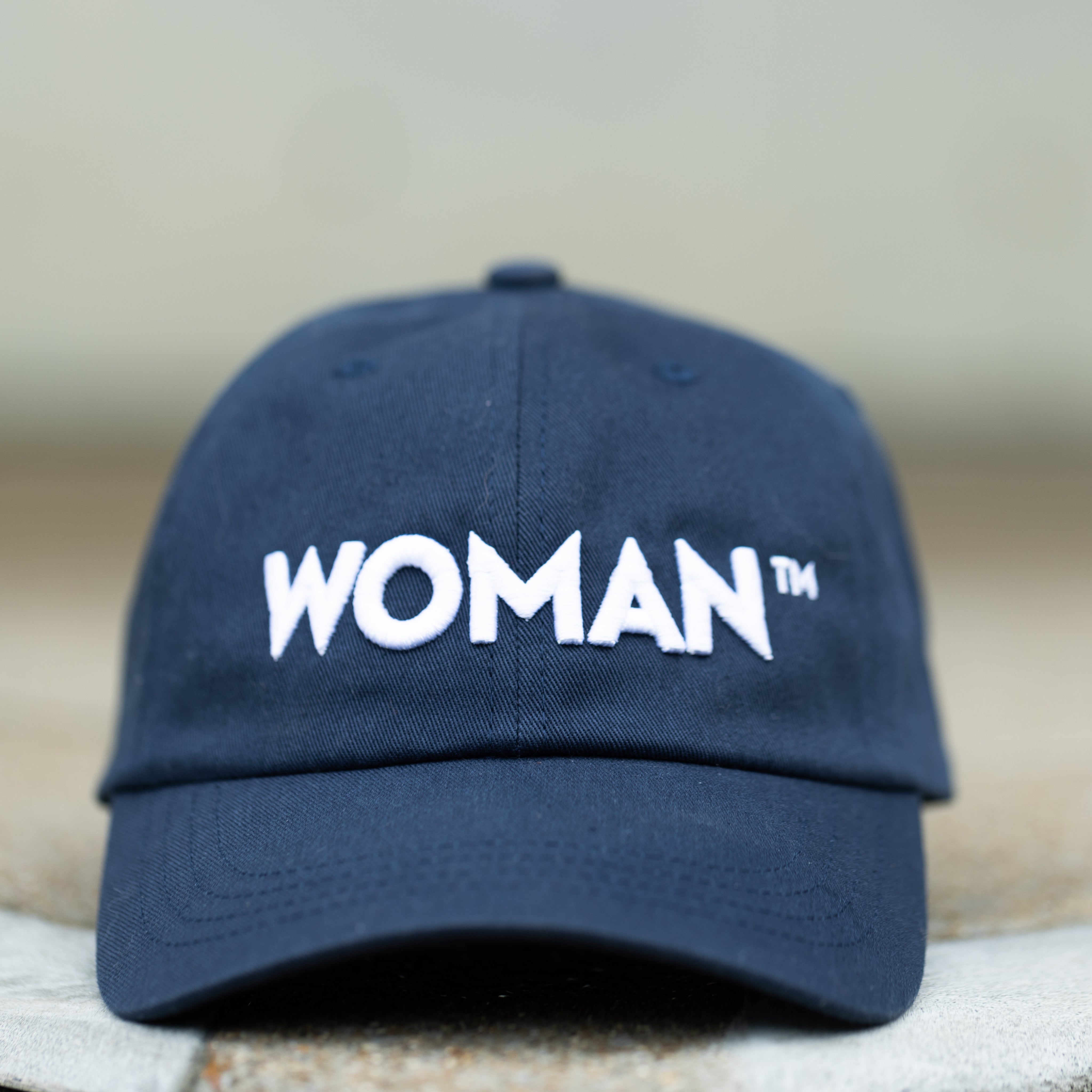 Woman™ Cap on Navy with embroidered logo front view